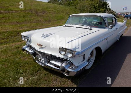 Three-quarters front view of a White, 1958, Cadillac Eldorado Seville, on display at the 2023 Deal Classic Car Show Stock Photo