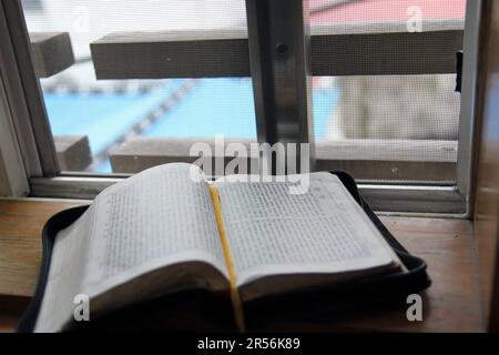 Old Korean Bible book and prayer concept shooting, Old Bible book that is difficult to find Stock Photo