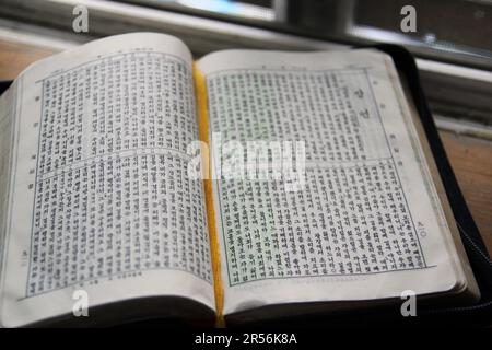 Old Korean Bible book and prayer concept shooting, Old Bible book that ...