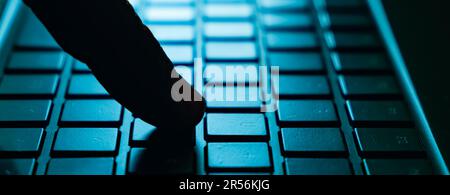 Close-up of hands typing on a computer keyboard. Keyboard closeup view Stock Photo