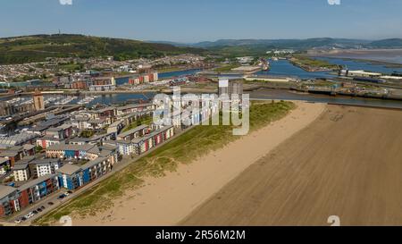 Editorial Swansea, UK - May 21, 2023: Drone view of Swansea Bay, Marina, docks, River Tawe and the East Side under Kilvey Hill. Stock Photo