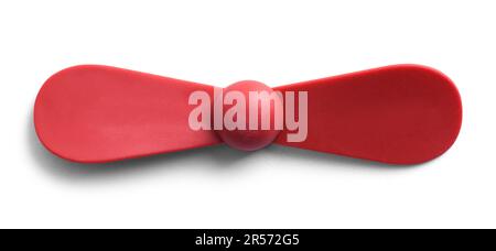 Red Toy Propeller Cut Out on White. Stock Photo