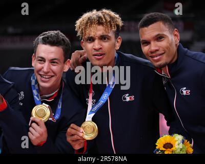 AUG 7, 2021 - Tokyo, Japan: Jenia GREBENNIKOV, Barthelemy CHINENYEZE and Stephen BOYER of Team France win the Gold Medal in the Volleyball Men's tournament at the Tokyo 2020 Olympic Games (Photo: Mickael Chavet/RX) Stock Photo