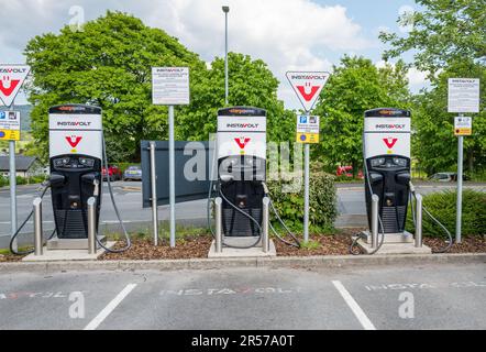 Instavolt, vehicle rapid charging public station at Booths shoppping centre, Kirkby Lonsdale, Yorkshire, England. Stock Photo