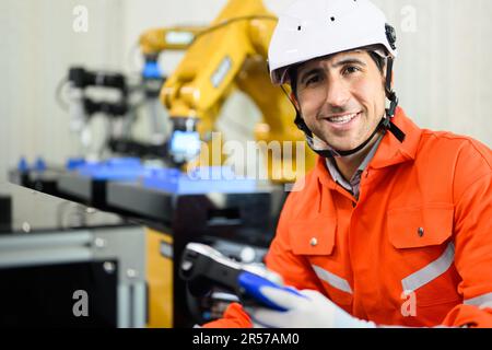 Maintenance engineer working and solving problems on machine Stock Photo