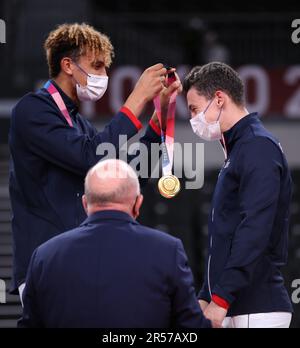 AUG 7, 2021 - Tokyo, Japan: Barthelemy CHINENYEZE and Jenia GREBENNIKOV of Team France win the Gold Medal in the Volleyball Men's tournament at the Tokyo 2020 Olympic Games (Photo: Mickael Chavet/RX) Stock Photo