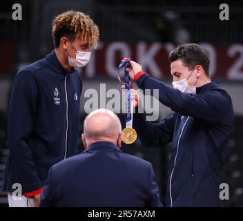 AUG 7, 2021 - Tokyo, Japan: Barthelemy CHINENYEZE and Jenia GREBENNIKOV of Team France win the Gold Medal in the Volleyball Men's tournament at the Tokyo 2020 Olympic Games (Photo: Mickael Chavet/RX) Stock Photo