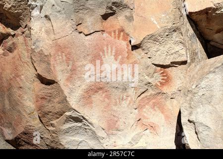 Prehistoric art - handprints in Cueva de las Manos cave and complex of rock art sites in Santa Cruz province, Argentina Stock Photo