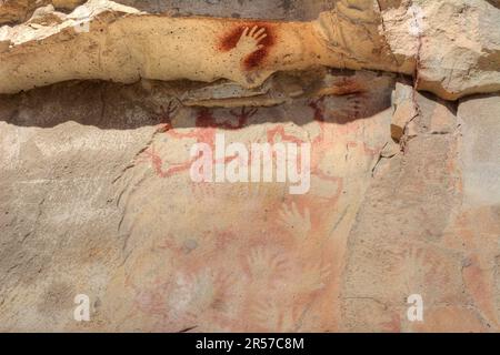 Prehistoric art - handprints in Cueva de las Manos cave and complex of rock art sites in Santa Cruz province, Argentina Stock Photo