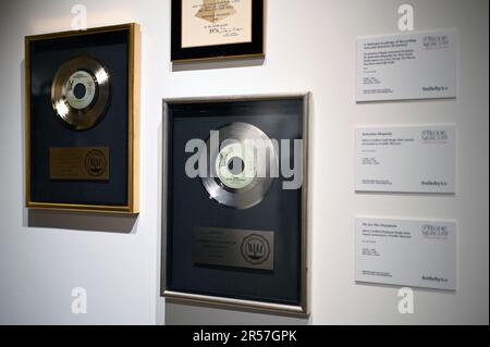 New York, USA. 01st June, 2023. Certified gold and platinum records by Queen on display at Sotheby's, New York, June 1, 2023. Some never-before-seen private collection items on display, including clothes and jewelry worn by Mercury during Queen concerts, handwritten lyrics, personal items and art, to go up for auction in London this coming September. (Photo by Anthony Behar/Sipa USA) Credit: Sipa USA/Alamy Live News Stock Photo