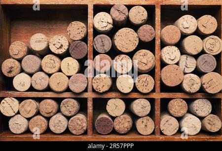 Bottle cork in a wooden box using as background or header, wine concept Stock Photo
