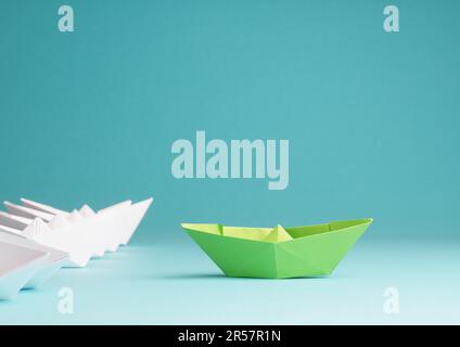 New ideas, creativity and various innovative solutions or leadership, ecology concept, paper boats on a bluish background Stock Photo