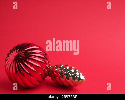 Vintage Christmas baubles on a red background with space for your text or image, seasonal holiday concept Stock Photo