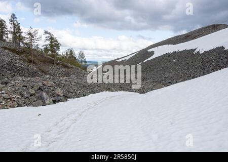The snow is melting in the fells in Finnish Lapland Stock Photo