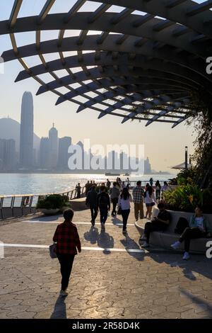 Hong Kong - February 28, 2023: The Avenue of Stars, modelled on the Hollywood Walk of Fame, is an avenue located along the Victoria Harbour waterfront Stock Photo