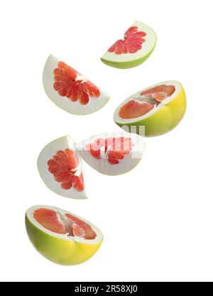 Fresh pomelo fruits falling on white background Stock Photo