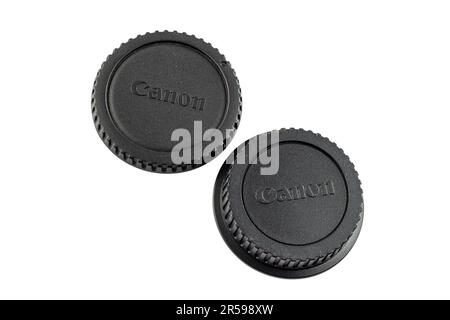 Swat, Pakistan - February 17, 2023: Canon lens front and back cover caps on a white background Stock Photo