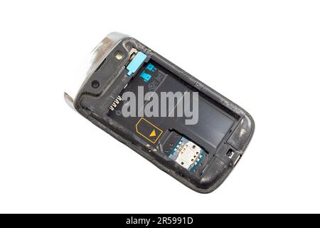The back side of a smart phone with removable battery open isolated on a white background. Stock Photo