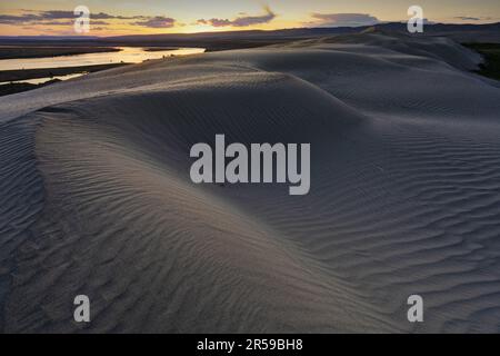 Sand dune overlooking Columbia River at sunset, Hanford Reach National Monument, Washington, USA Stock Photo