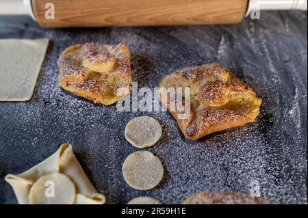 Baked and unbaked puff pastry. Baking preparation Stock Photo