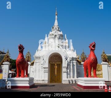 Entrace of royal temple, Wat Phrathat Haripunchai, in Lamphun, Thailand. The main door was built and decorated according to local Lanna art. Stock Photo