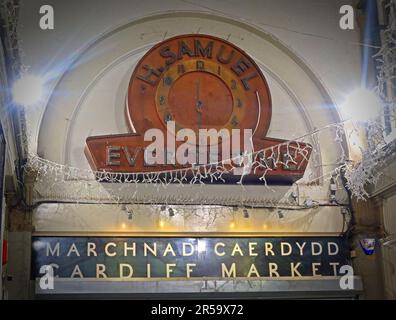 Bilingual Welsh and English signage at Cardiff Market (Marchnad Caerdydd), a historic Victorian indoor market in Cardiff city centre, Wales Stock Photo