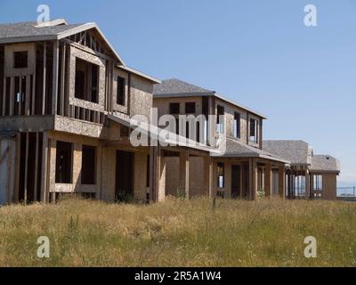 Structures in a failed and abandoned housing development Stock Photo ...