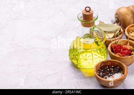 Various dried spices and olive oil Stock Photo