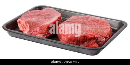 Two pieces of beef steak in a black disposable polystyrene plate on a white isolated background Stock Photo