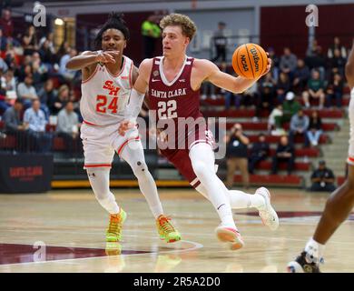 Santa Clara, United States. 16th Mar, 2023. Santa Clara's Brandin Podziemski (22) dribbles against Sam Houston's Donte Powers (24) in the first half in the first round of the National Invitation Tournament at the Leavey Center at Santa Clara University in Santa Clara, California, on Wednesday, March 15, 2023. (Photo by Nhat V. Meyer/Bay Area News Group/TNS/Sipa USA) Credit: Sipa USA/Alamy Live News Stock Photo