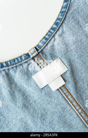 Blank Size Tag on Jeans Waist Stock Photo - Alamy