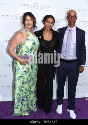 Libby Boyce, Victor Boyce and Yara Shahidi, from left, arrive at the