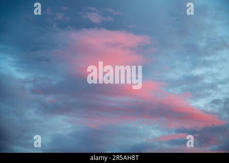 Dramatic cloudscape with majestic, beautiful clouds in a serene, scenic sky with no people present. Stock Photo