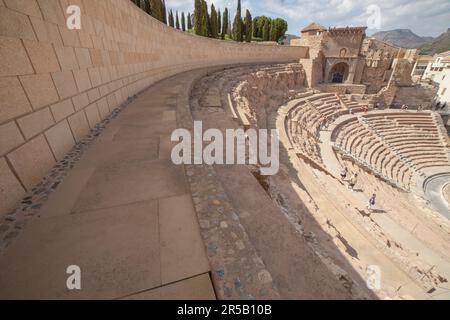 Cartagena, Spain - September 14th, 2018: Old cathedral built over the upper part of the theater. Roman Theater of Cartagena city in Spain Stock Photo