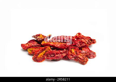 A heap of dried tomatoes on a white background with copy space Stock Photo