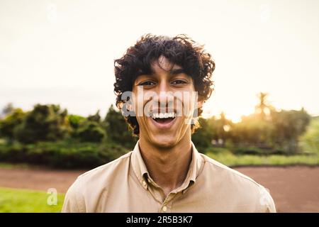 Happy young teenager smiling in front of camera Stock Photo