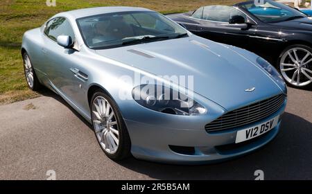 Three-quarters front view of a Silver, 2007, Aston Martin V12, DB9, on display at the 2023 Deal Classic Car Show Stock Photo