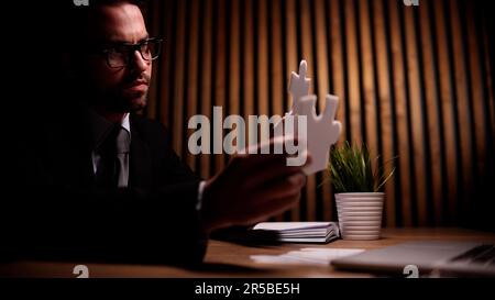 Attractive young guy is solving a problem Stock Photo