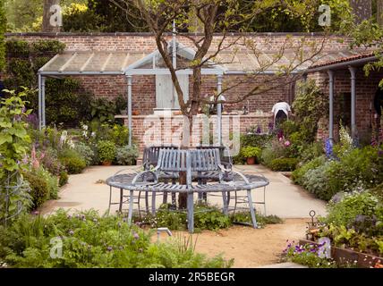 The Savills Garden designed by Mark Gregory at the Chelsea Flower Show 2023 in London, UK. Stock Photo