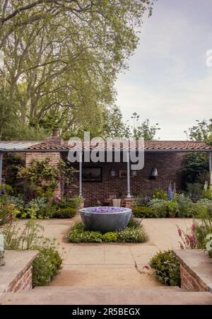 The Savills Garden designed by Mark Gregory at the Chelsea Flower Show in London, UK. Stock Photo