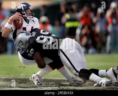 Denver Broncos vs. Las Vegas Raiders. NFL Game. American Football League  match. Silhouette of professional player celebrate touch down. Screen in  back Stock Photo - Alamy