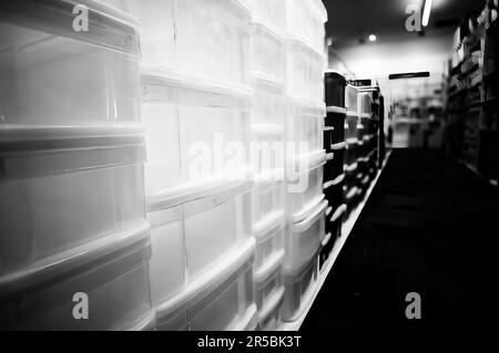 Rows of stacked plastic containers for organization and storage. Stock Photo