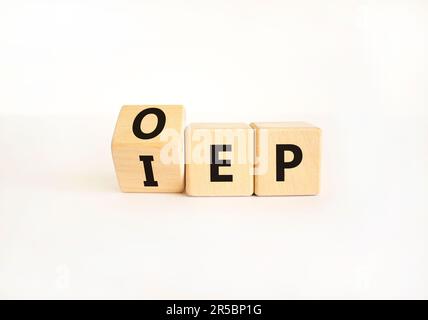 IEP or OEP symbol. Concept words IEP initial enrollment period OEP open enrollment period. Beautiful white table white background. Medical initial or Stock Photo