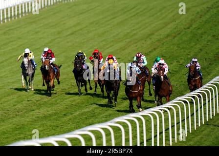 Runners and riders in action as they compete in the Winners Wear Cavani Handicap during ladies day of the 2023 Derby Festival at Epsom Downs Racecourse, Epsom. Picture date: Friday June 2, 2023. Stock Photo