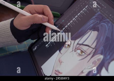 Woman hand drawing with graphics tablet, working designer. Caserta, January, 02TH 2022. Stock Photo