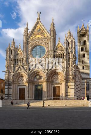 Siena, Siena Province, Tuscany, Italy.  The Romanesque-Gothic duomo, or cathedral, built in the 13th century.  Metropolitan Cathedral of Saint Mary of Stock Photo