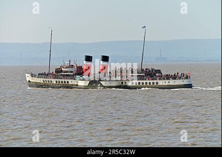 Clevedon, UK. 02nd June, 2023. On a very hot afternoon the Only Worlds Last Paddle Steamer is seen picking up queues of passengers from Clevedon Pier, the only Grade 1 Listed operational Pier in England. Picture Credit: Robert Timoney/Alamy Live News Stock Photo