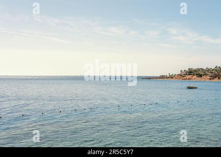 Amazing view of Red sea surface from coast. Natural background sunny day sky. Stock Photo