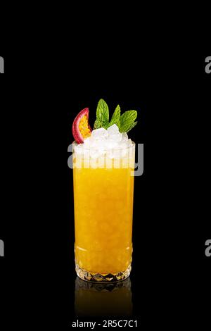 Fresh Mai Tai cocktail  with white rum, liqueur, sugar syrup, lime juice, mint and guava fruit. Fruity frozen alcoholic cocktail. Stock Photo