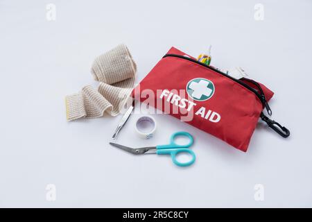 First aid medical kit and supplies on white background, copy space Stock Photo